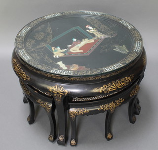 A circular Chinese black lacquered and inlaid hardstone nest of 4 interfitting coffee tables raised on shaped supports 21"h x 30" diam.  and 14" x 18 1/2" x 12" (slight chips to corners) 