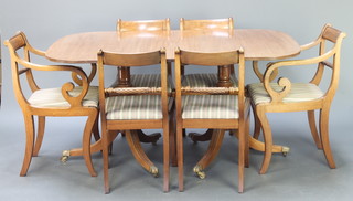 A Georgian style dining suite comprising oval D end extending dining table with 1 extra leaf  29"h x 39"w x 57" x 76" when extended, together with 6 bar back dining chairs  with turned mid rails and upholstered drop in seats, raised on sabre supports 