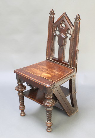 A Victorian oak Gothic metamorphic library step in the form of a chair raised on turned supports 