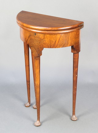 A Georgian style mahogany demi-lune occasional table, raised on club supports 28"h x 18"w x 9" when closed x 18" when extended 