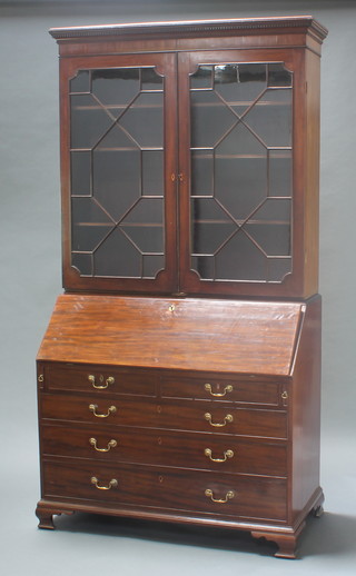 A Georgian mahogany bureau bookcase, the upper section with dentil cornice fitted shelves enclosed by astragal glazed panelled doors, the base with a fall front revealing a well fitted interior above 2 short and 3 long drawers with brass swan neck drop handles 92 1/2"h x 48"w x 22 1/2" 