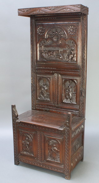 A carved oak settle with raised back formed from old timber 64"h x 26 1/2"w x 16"d 