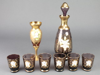 A Venetian amethyst glass ewer together with 6 tots and a similar vase 