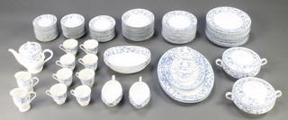 A Noritake Arcadia pattern tea and dinner service comprising 8 tea cups, 13 saucers, teapot, 2 milk jugs, 12 small plates, 13 medium plates, 12 dinner plates, 2 oval meat plates, 2 oval serving plates, 12 dessert bowls, 3 serving bowls, 2 sauce boats, 2 lidded pots, 2 tureens and covers