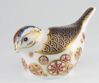 A Royal Crown Derby paperweight in the form of a Gold Crest with gold stopper 3 1/2"