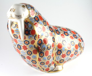 A Royal Crown Derby Japan pattern paperweight in the form of walrus with gold stopper 5"