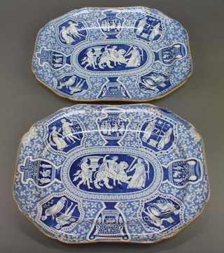 A pair of Victorian blue and white octagonal meat plates decorated with Roman figures and symbols 15" 