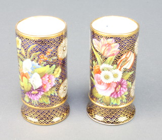 A pair of 19th Century Spode spill vases, the blue and gilt scale ground decorated with spring flowers no. 1166 4" 