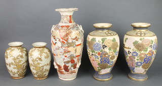 A pair of late Satsuma oviform vases decorated with figures amongst flowers 12", a later ditto 15" and a pair of modern oviform ditto decorated with flowers 8" 