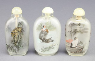 A Chinese interior decorated flattened scent bottle, decorated with a horse and figure riding a buffalo 3", a ditto decorated tigers and another decorated cats 