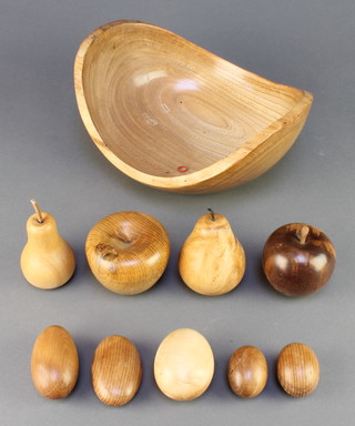 A turned Sussex elm bowl 10" containing a collection of turned wooden fruit and eggs 