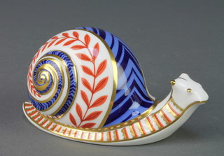 A Royal Crown Derby Japan pattern paperweight in the form of a snail 5" (lacking stopper)