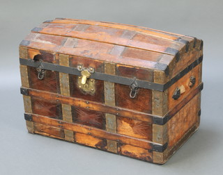 A Victorian domed and wooden bound travelling trunk 20"h x 31"w x 17"d 