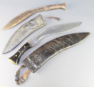 A Kukri with 12" blade and horn grip and 1 other with 11" blade 
