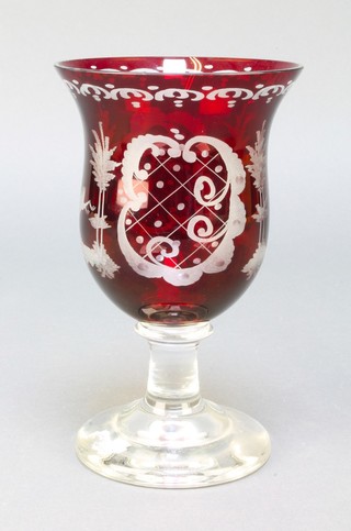 A Bohemian red flash glass goblet decorated with deer and birds amongst trees 7" 
