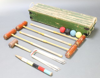 A Jaques croquet set comprising 4 balls, peg, 4 mallets and 6 hoops contained in a Harrods box marked Specially Made for Harrods 