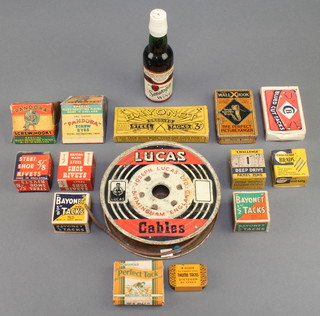 A cylinder of Lucas Cables, a bottle of Sanatogen tonic wine, 2 cartons of Pandora's screw eyes and various packets of tacks contained in a Lion's milk chocolate bar box 