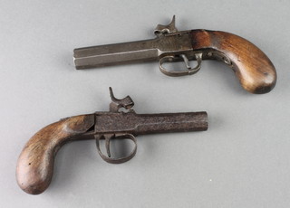A 19th Century percussion pocket pistol with 4" barrel, heavily corroded together with 1 other later pistol 