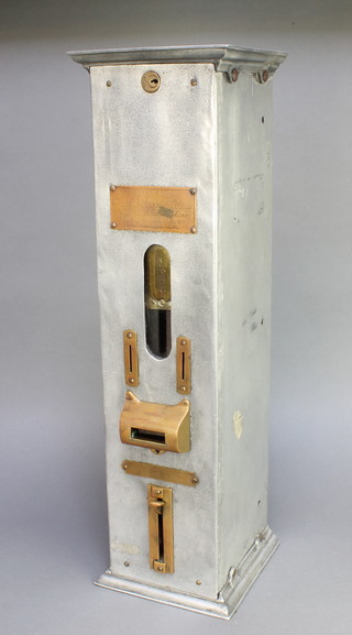 Charles W Bicknell, an aluminium and brass Woodbine Cigarette wall mounted vending machine 25"h x 7"w x 7"d (no key)  
