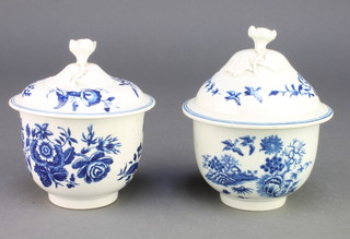 A near pair of 19th Century Worcester blue and white pots and covers decorated with garden views and flowers, having moulded floral knops 5" 