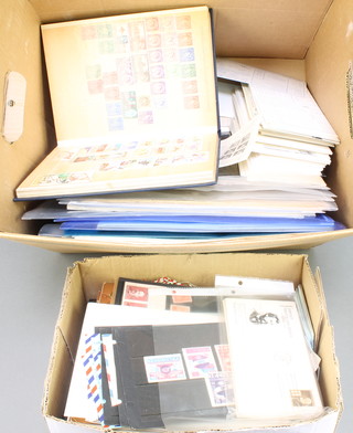 A box of 2 stock books of World stamps and mixed stamps 