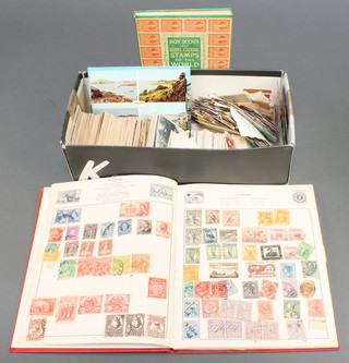 A Capital album of used World stamps and Gordon Entwistle Boy Scout and Girl Guides Stamps of the World 