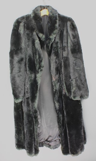 A lady's black simulated fur coat, a brown half length fur coat  and 1 other fur coat