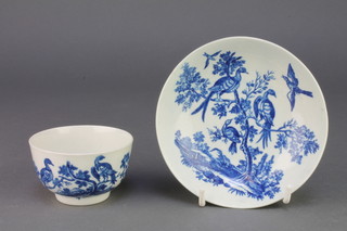 A 19th Century Worcester teabowl and saucer decorated with exotic birds amongst flowers 