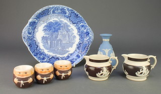 Two Victorian 2 colour jugs decorated with figures, 3 Hummel egg cups, a Wedgwood Jasper vase and a blue and white plate 
