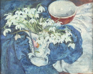Mid 20th Century oil on canvas, unsigned, still life study of snowdrops in a vase with a bowl 7 3/4" x 9 3/4", with label to the reverse  