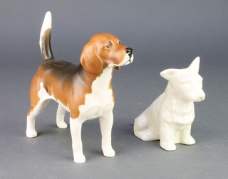 A Belleek figure of a terrier 4 1/2" and a Royal Doulton figure of a standing beagle 6" 