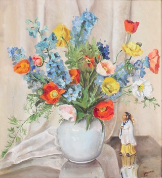 20th Century oil, indistinctly signed on canvas, still life study of spring flowers in a vase beside a Chinese porcelain figure 22" x 19 1/2" 