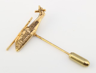 From the estate of Captain Eric M Brown a gilt metal stick pin in the form of a EH101 helicopter 