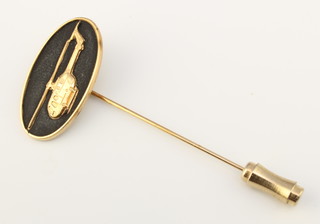 From the estate of Captain Eric M Brown a gilt metal stick pin in the form of a Eurocopter 
