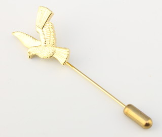 From the estate of Captain Eric M Brown a gilt metal stick pin in the form of an "eagle" 