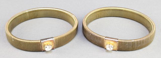 From the estate of Captain Eric M Brown a pair of gilt metal sleeve garters 