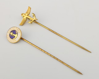 From the estate of Captain Eric M Brown a gilt and enamelled stick pin marked Deutscher Marine Bund and 1 other in the form of a winged anchor 