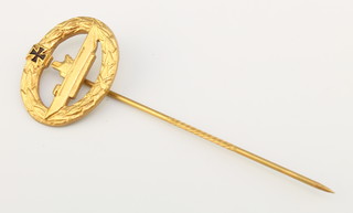 From the estate of Captain Eric M Brown an Imperial  German gilt metal stick pin decorated a boat, the reverse marked Fleck Hamburg
