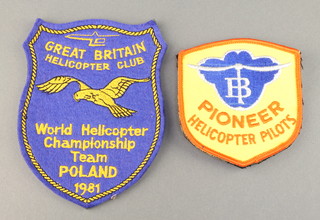 From the estate of Captain Eric M Brown an embroidered Pioneer Helicopter badge and an embroidered Great Britain Helicopter Club World Helicopter Championship Team Poland 1980 badge 