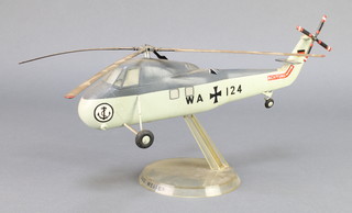 From the estate of Captain Eric M Brown a Sikorsky S-58 model of a helicopter 