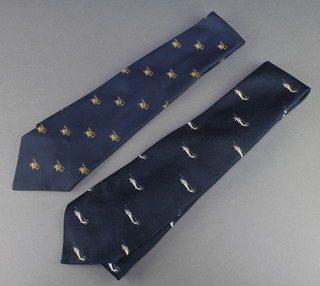 From the estate of Captain Eric M Brown a blue polyester Golden Clasp tie and one other 