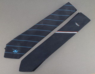 From the estate of Captain Eric M Brown a blue polyester tie decorated a Sikorsky S61 and 1 other EH101 