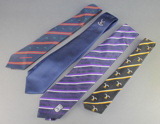 From the estate of Captain Eric M Brown a South African Air Force College blue polyester  tie, a FRFC tie and 2 striped ties 
