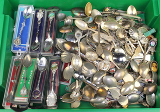 A large quantity of silver plated souvenir spoons