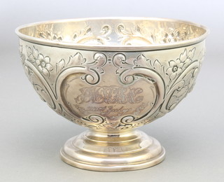 A Victorian repousse silver rose bowl with floral decoration and presentation inscription London 1894, 234 grams 6" 