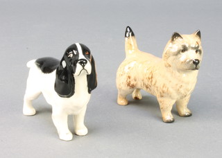 A Beswick figure of a terrier 3 1/4", ditto of a spaniel 4" 