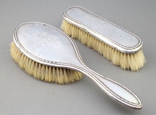 A silver mounted hair brush and clothes brush Birmingham 1919 