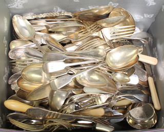 A pair of Edwardian silver plated serving spoons with apostle style handles and minor plated cutlery 