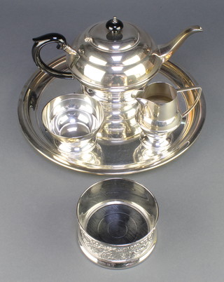 A silver plated Art Deco style 3 piece tea set, ditto tray and coaster 