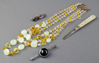 A silver and banded agate bar brooch, an amethyst ditto, a bead necklace and a silver and mother of pearl fruit knife 